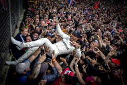 Race winner Lewis Hamilton, Mercedes AMG F1, celebrates victory with the fans