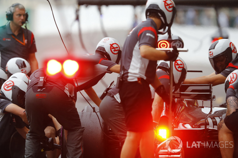 The Haas F1 Team pit crew at work during practice