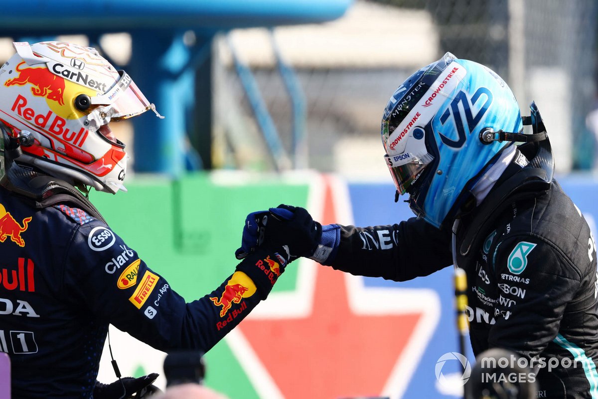 Valtteri Bottas, Mercedes, 1st position, is congratulated by Max Verstappen, Red Bull Racing, 2nd position, in Parc Ferme