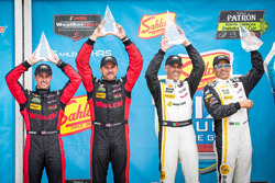 Переможці Жоао Барбоза та Крістіан Фіттіпальді, Action Express Racing, срібні призери Ерік Курран, Д