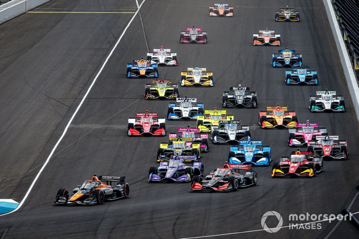 Patricio O'Ward, Arrow McLaren SP Chevrolet leads the field to the green flag, Will Power, Team Penske Chevrolet, Romain Grosjean, Dale Coyne Racing with RWR Honda, Christian Lundgaard, Rahal Letterman Lanigan Racing Honda, Alex Palou, Chip Ganassi Racing Honda