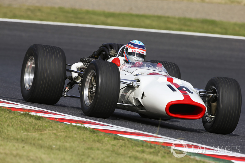 Takuma Sato drives a Honda RA300