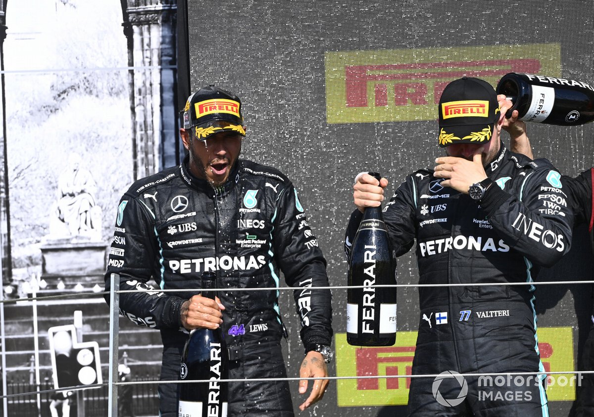 Lewis Hamilton, Mercedes, 1st position, and Valtteri Bottas, Mercedes, 3rd position, on the podium