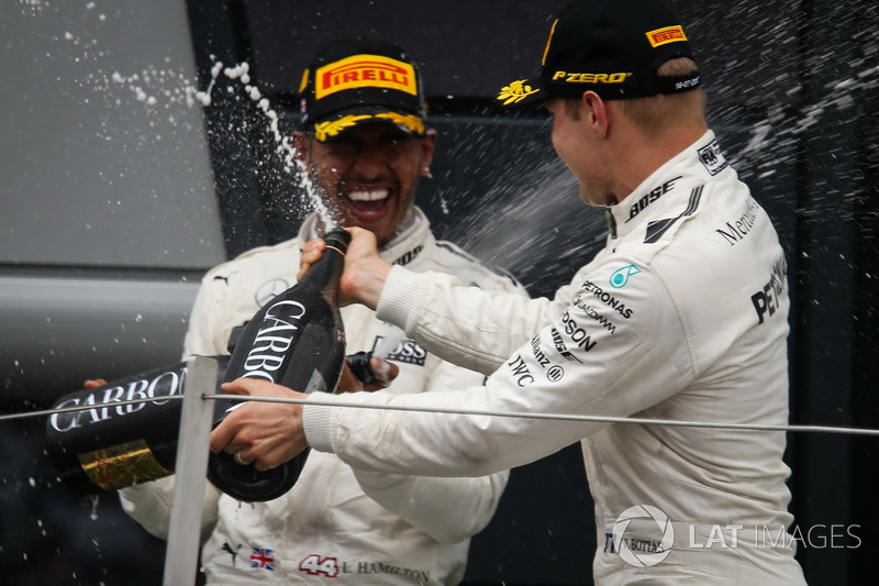 Race winner Lewis Hamilton, Mercedes AMG F1 and Valtteri Bottas, Mercedes AMG F1 celebrate on the podium