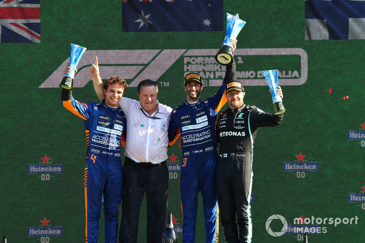 Lando Norris, McLaren, 2nd position, Zak Brown, CEO, McLaren Racing, Daniel Ricciardo, McLaren, 1st position, and Valtteri Bottas, Mercedes, 3rd position, on the podium