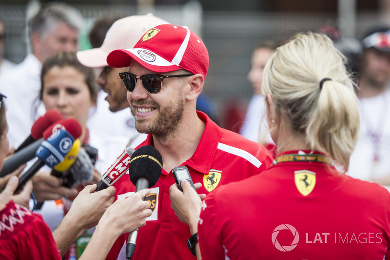 Sebastian Vettel, Ferrari talks with the media