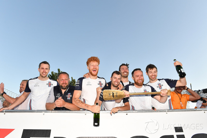 Williams celebrate on the podium at the raft race