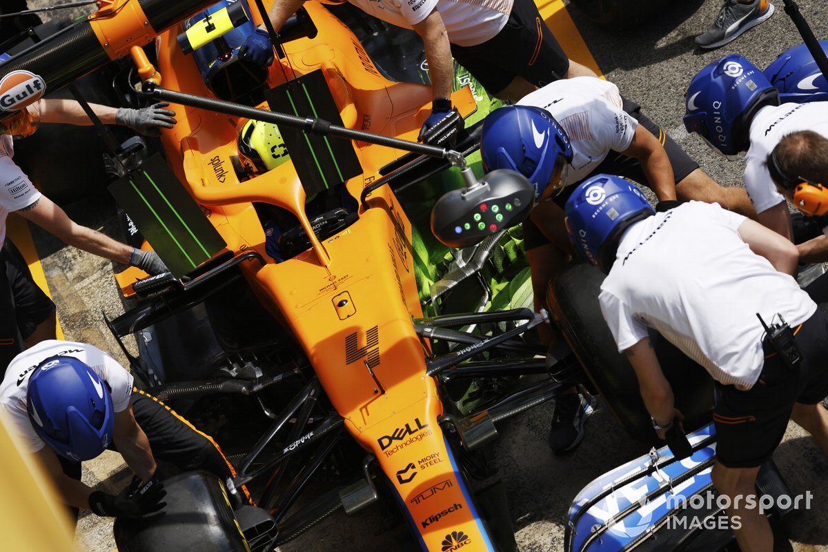 Lando Norris, McLaren MCL35M, in the pits during practice