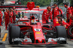 Sebastian Vettel, Ferrari makes a practice pitstop