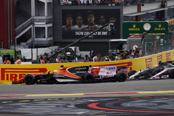 Fernando Alonso, McLaren MCL32, Sergio Perez, Sahara Force India F1 VJM10, through the first corner