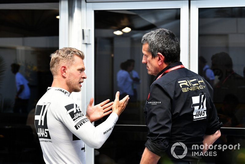Kevin Magnussen, Haas F1, talks with Guenther Steiner, Team Principal, Haas F1