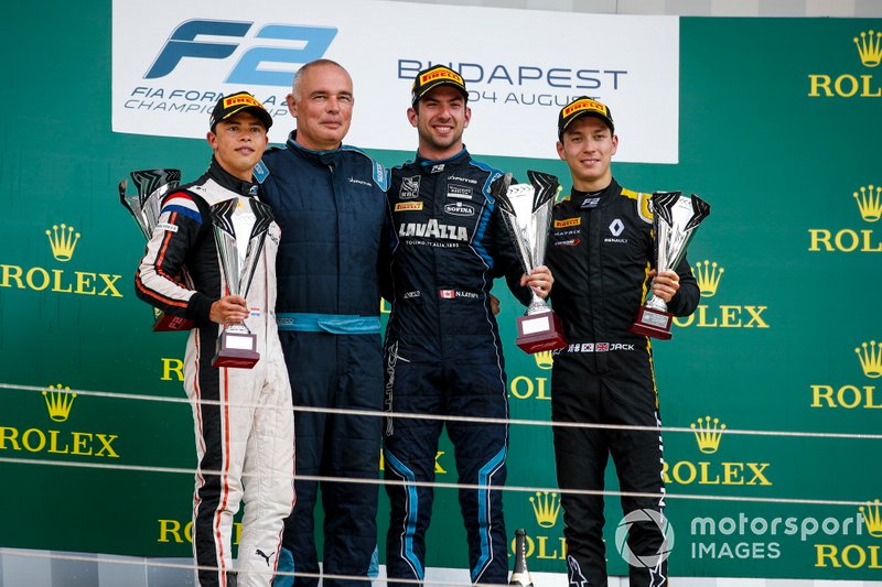 Race winner Nicholas Latifi, Dams celebrates on the podium with the trophy and Nyck De Vries, ART Grand Prix and Jack Aitken, Campos Racing
