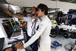 Lance Stroll, Williams, talks to his engineer