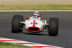 Takuma Sato drives a Honda RA300