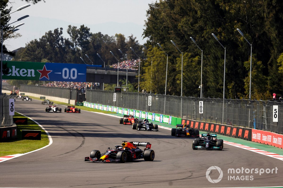 Max Verstappen, Red Bull Racing RB16B, Lewis Hamilton, Mercedes W12,and Sergio Perez, Red Bull Racing RB16B