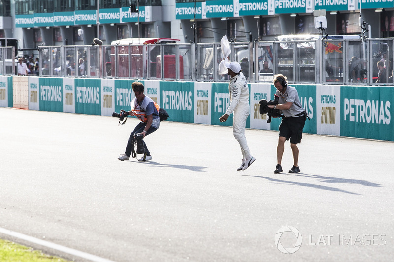 Pole sitter Lewis Hamilton, Mercedes AMG F1 celebrates in parc ferme