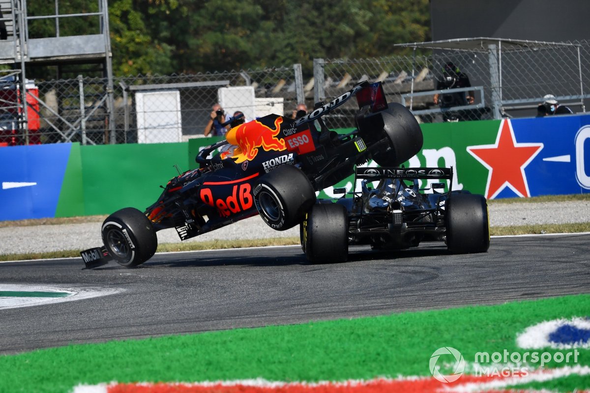 Max Verstappen, Red Bull Racing RB16B, and Lewis Hamilton, Mercedes W12, crash