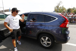 Fernando Alonso, McLaren, arrives at the circuit