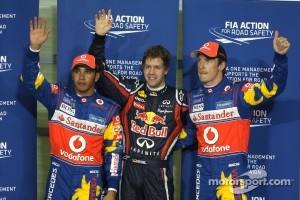 Pole winner Sebastian Vettel, Red Bull Racing, second place Lewis Hamilton, McLaren Mercedes, third place Jenson Button, McLaren Mercedes