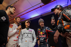Jenson Button, Michael Schumacher, Sebastian Vettel and Travis Pastrana