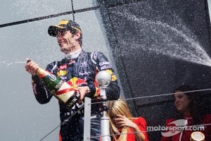 Race winner Mark Webber, Red Bull Racing celebrates on the podium