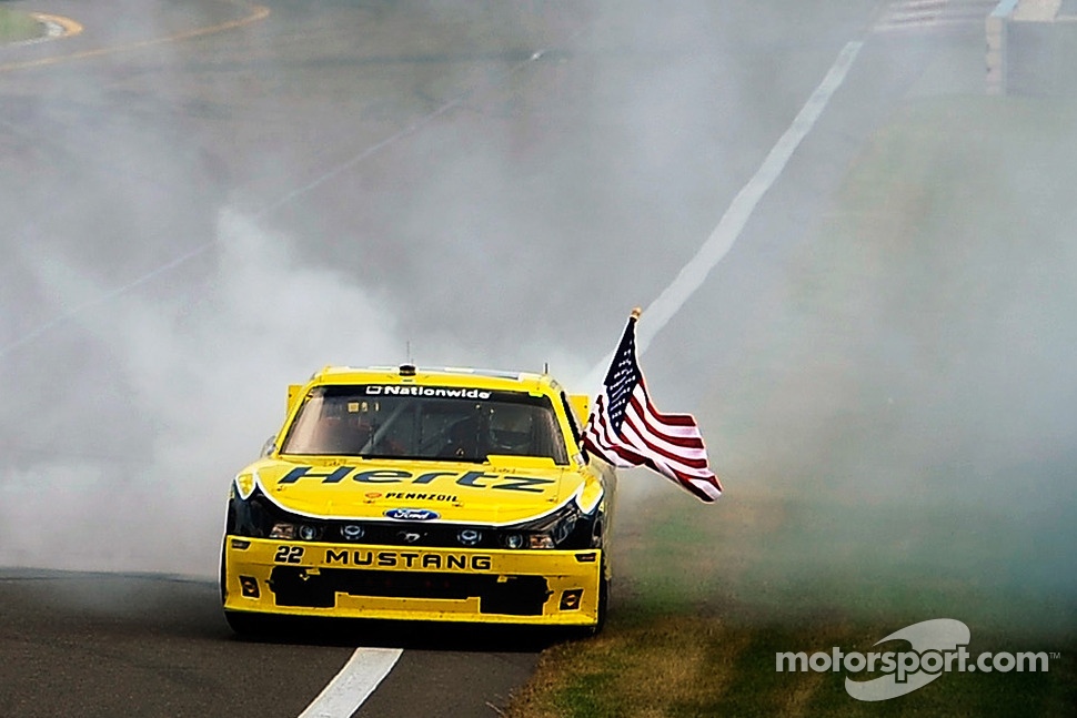 Race winner Brad Keselowski celebrates