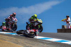 Davide Giugliano going the wrong way into the corkscrew