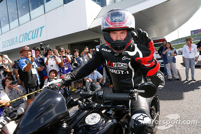 Keanu Reeves rides his motorcycle around Suzuka