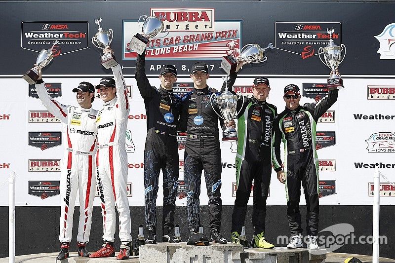 Podium: race winners Ricky Taylor, Jordan Taylor, Wayne Taylor Racing, second place Scott Sharp, Ryan Dalziel, Tequila Patrón ESM, third place Jonathan Bomarito, Tristan Nunez, Mazda Motorsports