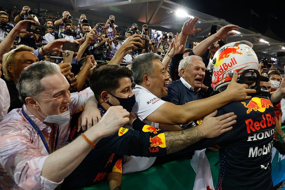 2021 drivers champion Max Verstappen, Red Bull Racing, 1st position, celebrates in Parc Ferme with his team and Helmut Marko, Consultant, Red Bull Racing 