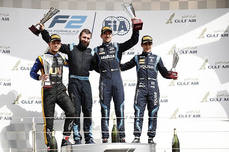 Luca Ghiotto, UNI VIRTUOSI, Nicholas Latifi, DAMS, and Sergio Sette Camara, DAMS, celebrate on the podium