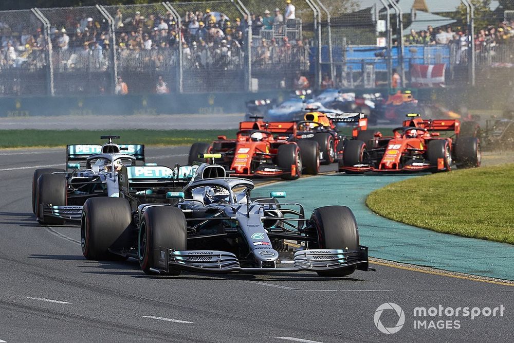 Valtteri Bottas, Mercedes AMG W10, leads Lewis Hamilton, Mercedes AMG F1 W10, Sebastian Vettel, Ferrari SF90, Charles Leclerc, Ferrari SF90, Max Verstappen, Red Bull Racing RB15, and the rest of the field at the start