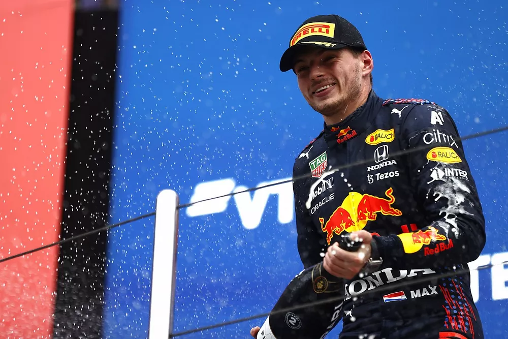 Max Verstappen, Red Bull Racing, 2nd position, sprays Champagne from the podium