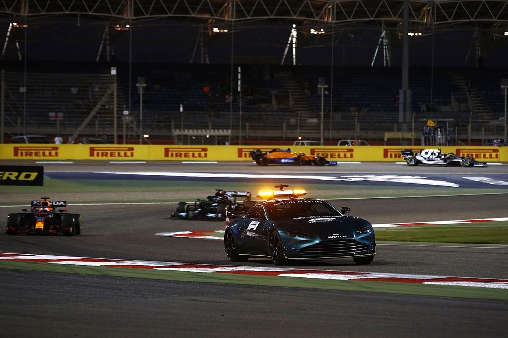 The Aston Martin Vantage Safety Car the field around headed by Max Verstappen, Red Bull Racing RB16B 