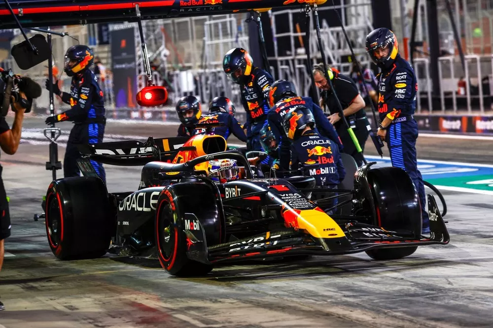 Max Verstappen, Red Bull Racing RB20 in the pit lane 