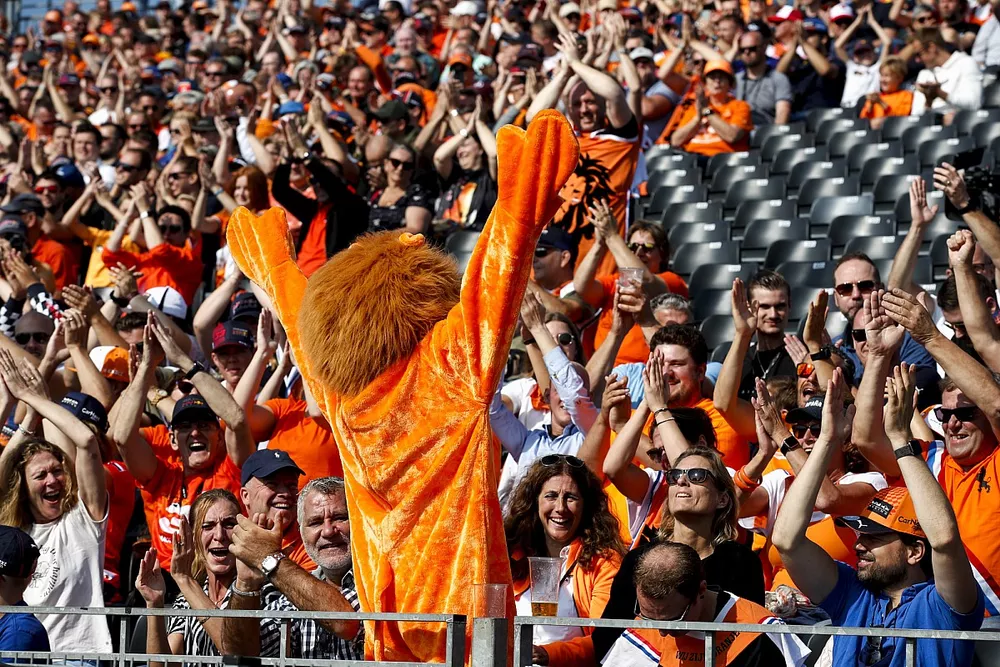 A Dutch fan dressed as a Lion in a grandstand