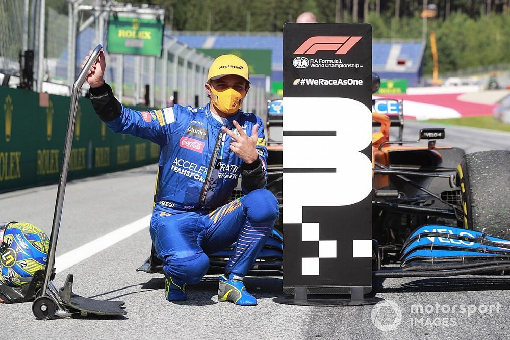 Lando Norris, McLaren, celebrates after taking a podium finish