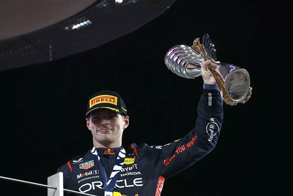 Max Verstappen, Red Bull Racing, 1st position, lifts his trophy