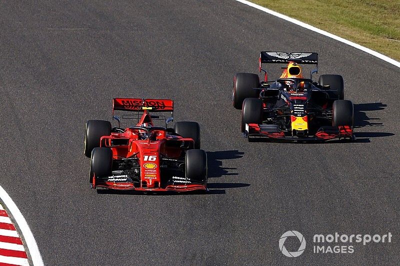 Charles Leclerc, Ferrari SF90, leads Max Verstappen, Red Bull Racing RB15