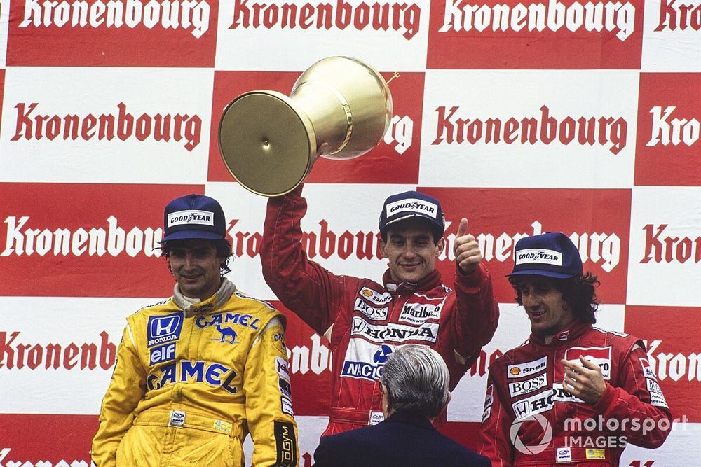 Podium: second place Nelson Piquet, Lotus, Race winner Ayrton Senna, McLaren,  third place Alain Prost, McLaren