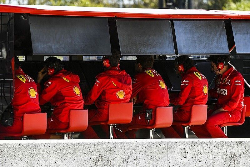 The Ferrari team on the pit wall