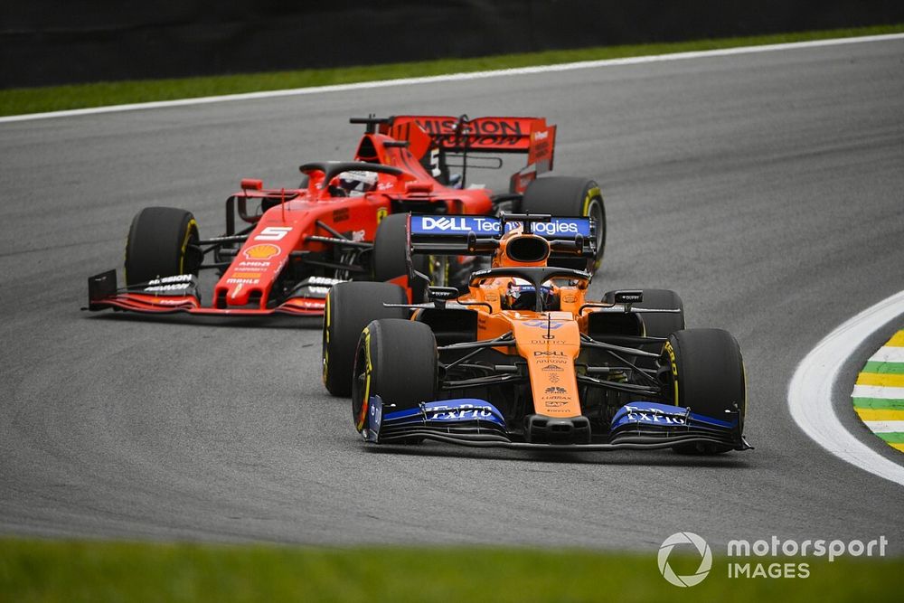 Carlos Sainz Jr., McLaren MCL34 et Sebastian Vettel, Ferrari SF90 