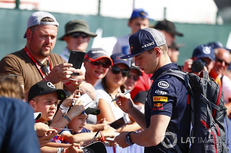 Max Verstappen, Red Bull Racing, signs autographs for fans