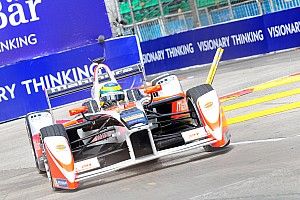 Mahindra satisfied with "hard earned" double points