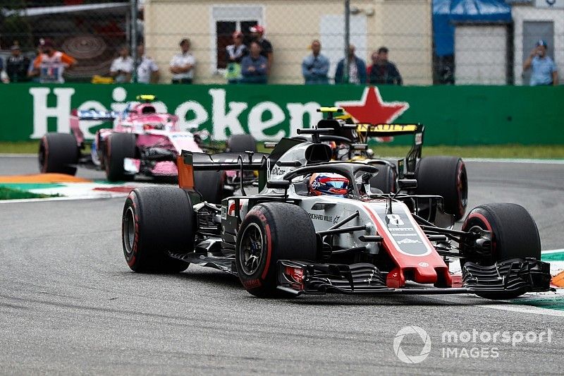 Romain Grosjean, Haas F1 Team VF-18, leads Carlos Sainz Jr., Renault Sport F1 Team R.S. 18, and Esteban Ocon, Racing Point Force India VJM11