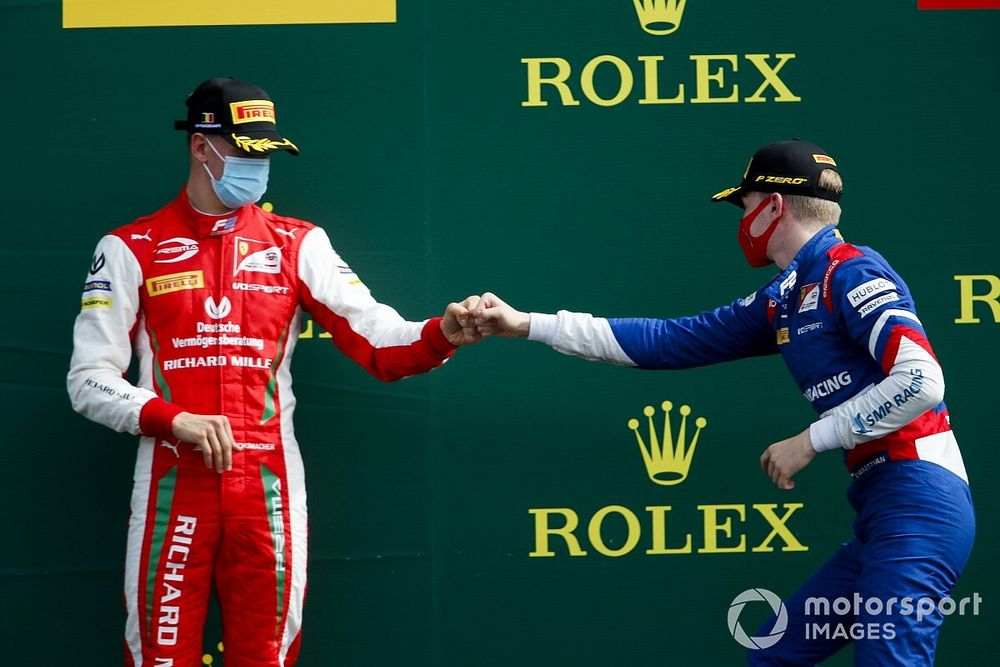 Race Winner Robert Shwartzman, Prema Racing and Mick Schumacher, Prema Racing celebrates on the podium