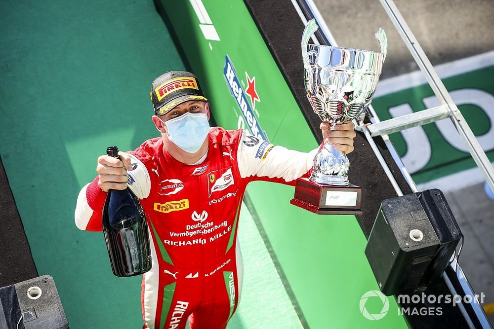 Race winner Mick Schumacher, Prema Racing celebrates on the podium with the trophy and the champagne