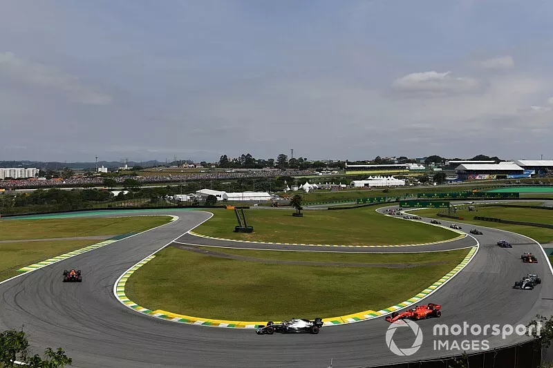 Max Verstappen, Red Bull Racing RB15, leads Lewis Hamilton, Mercedes AMG F1 W10, and Sebastian Vettel, Ferrari SF90