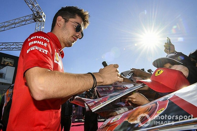 Charles Leclerc, Ferrari signs an autograph for a fan 