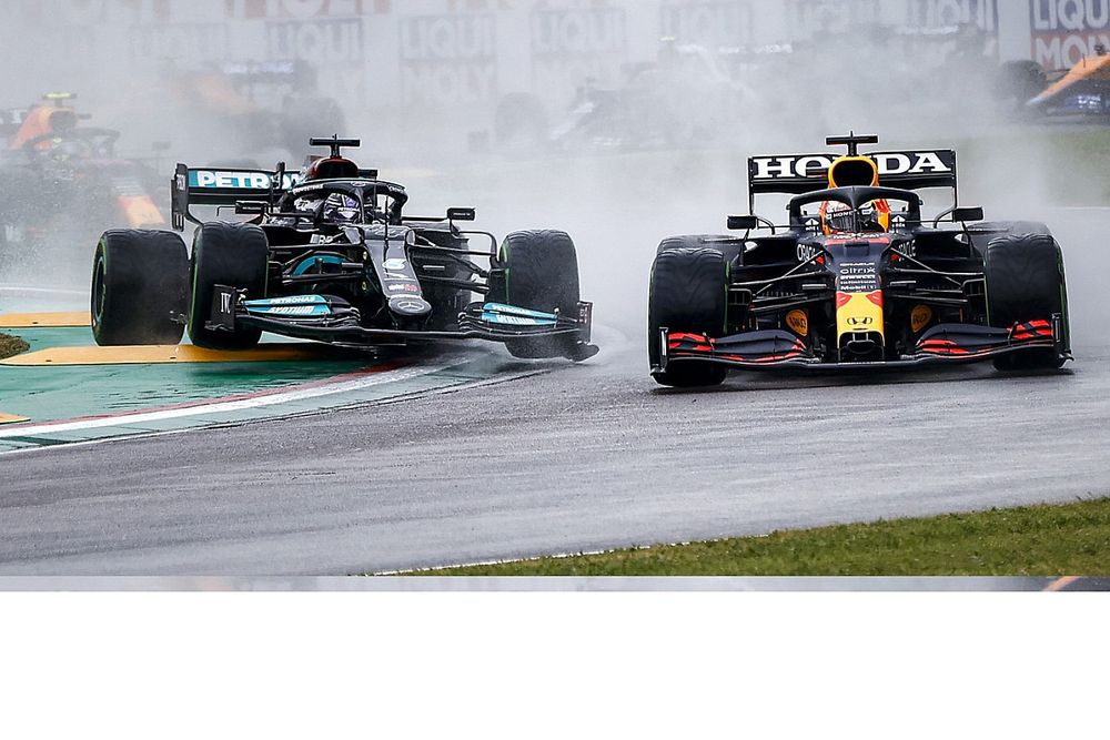 Max Verstappen, Red Bull Racing RB16B, battles with Lewis Hamilton, Mercedes W12, at the start